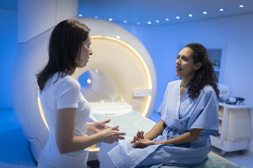 Women talking with someone about Brest MRI procedure